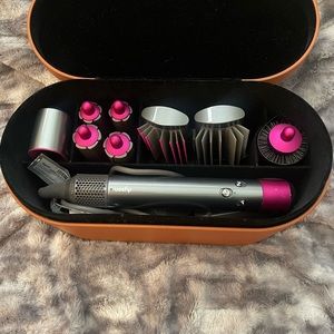 Used.Dyson hair wrap…it is under warranty